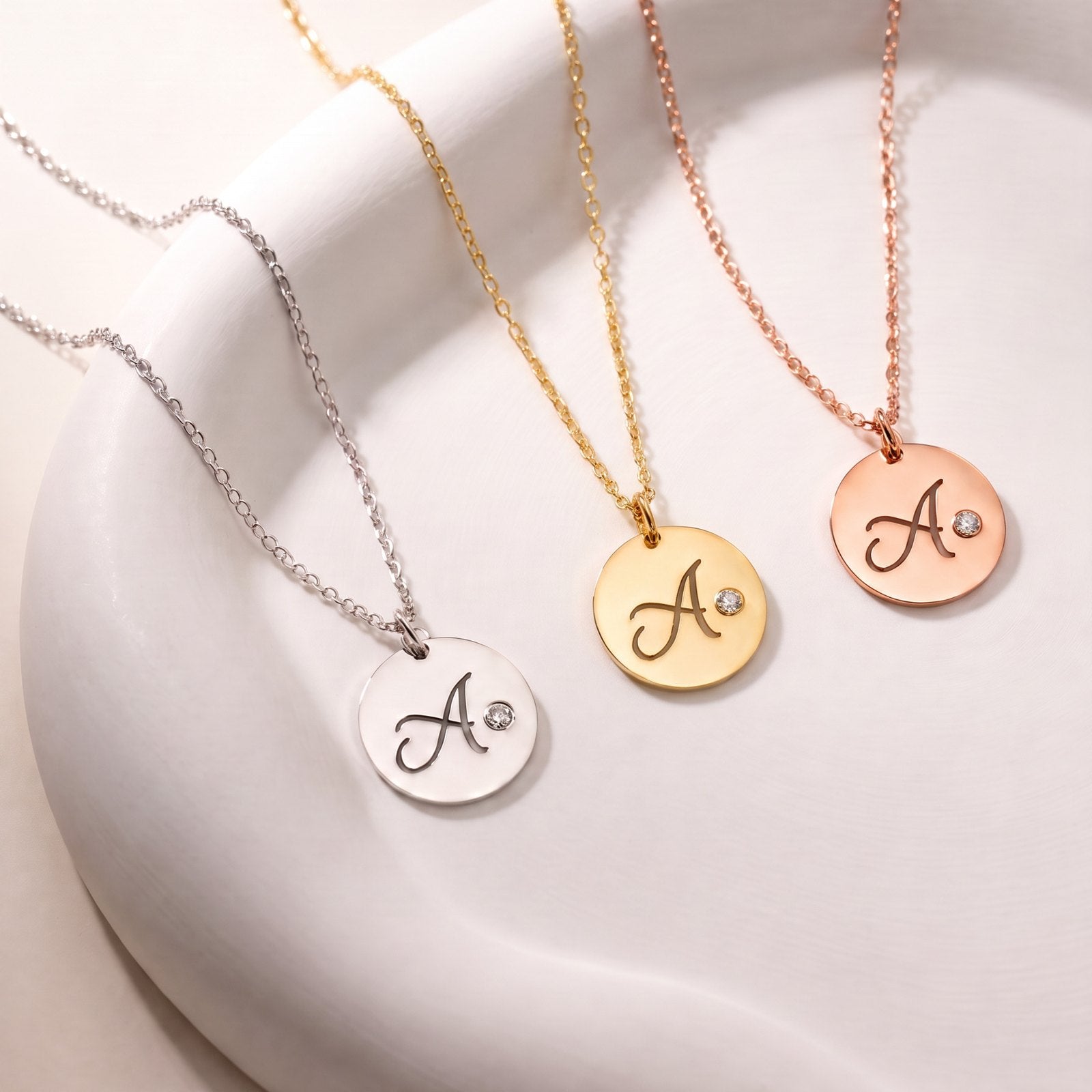 Script initial necklaces in silver, gold and rose gold