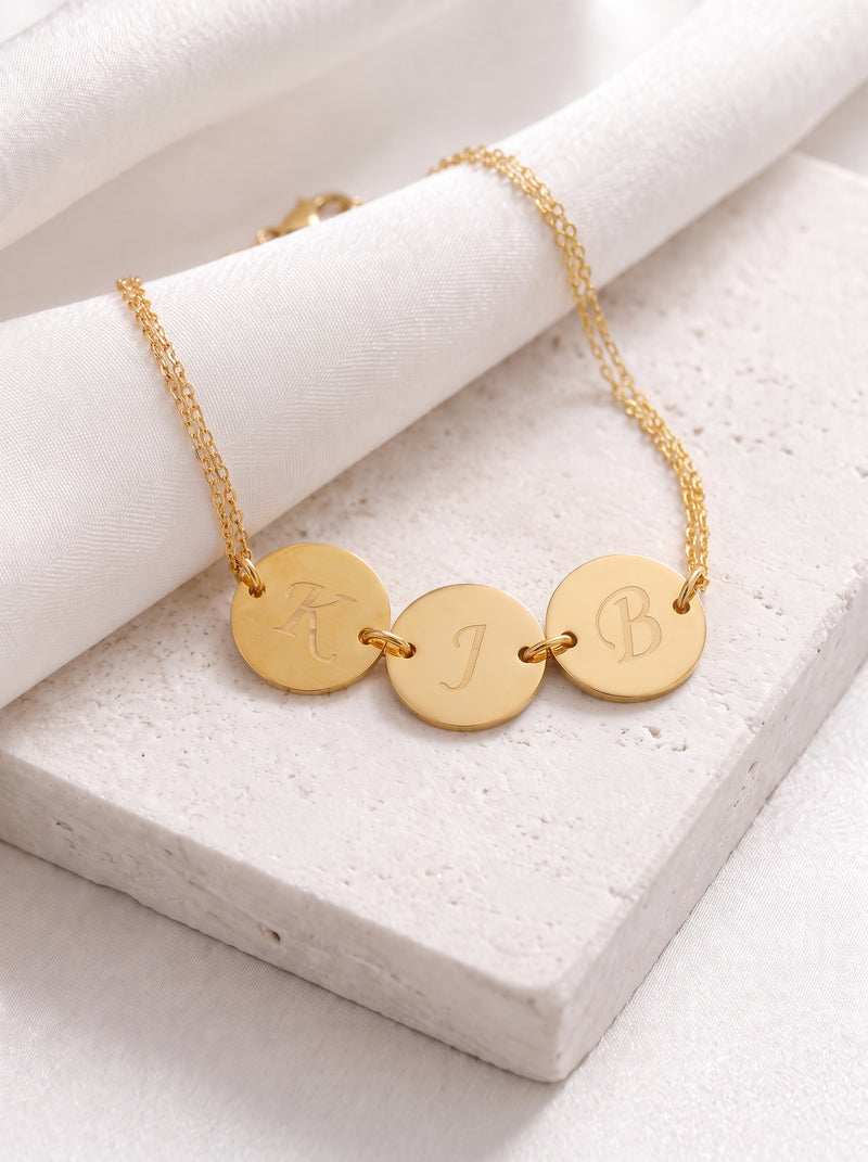 Pulsera de doble cadena con discos de iniciales