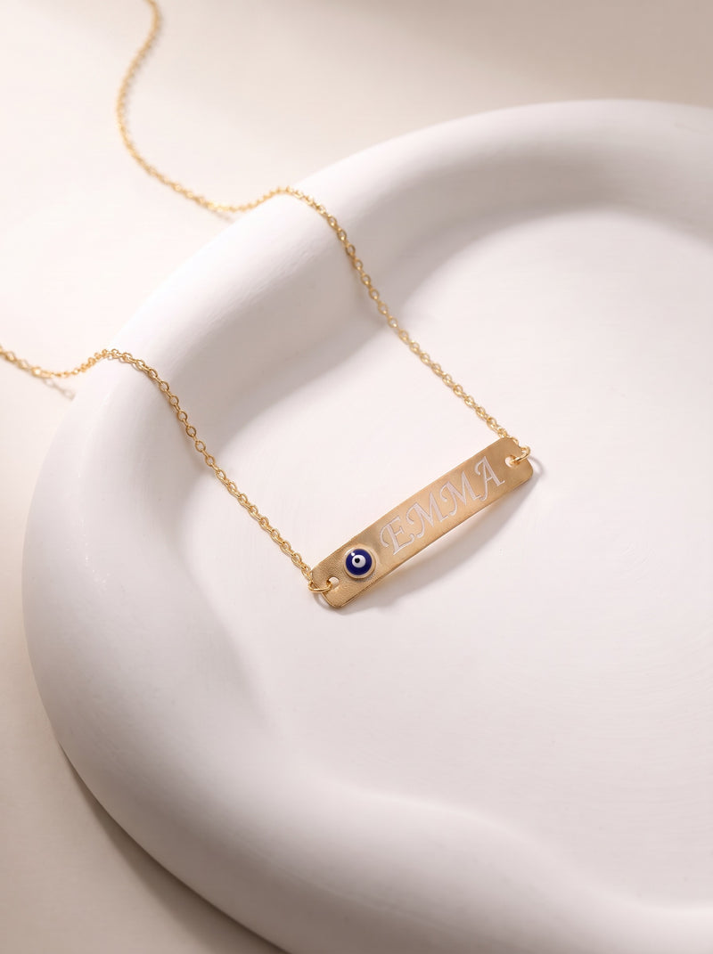 Pulsera con placa de nombre grabada y ojo turco